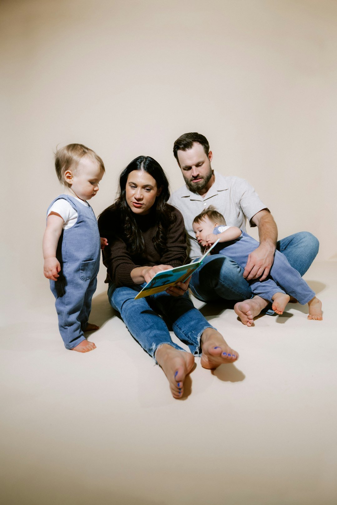 family using tablets at home
